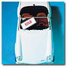 car with sold sign